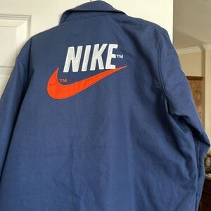 Large Nike thermal jacket, new without tags. Waterproof and quilted.